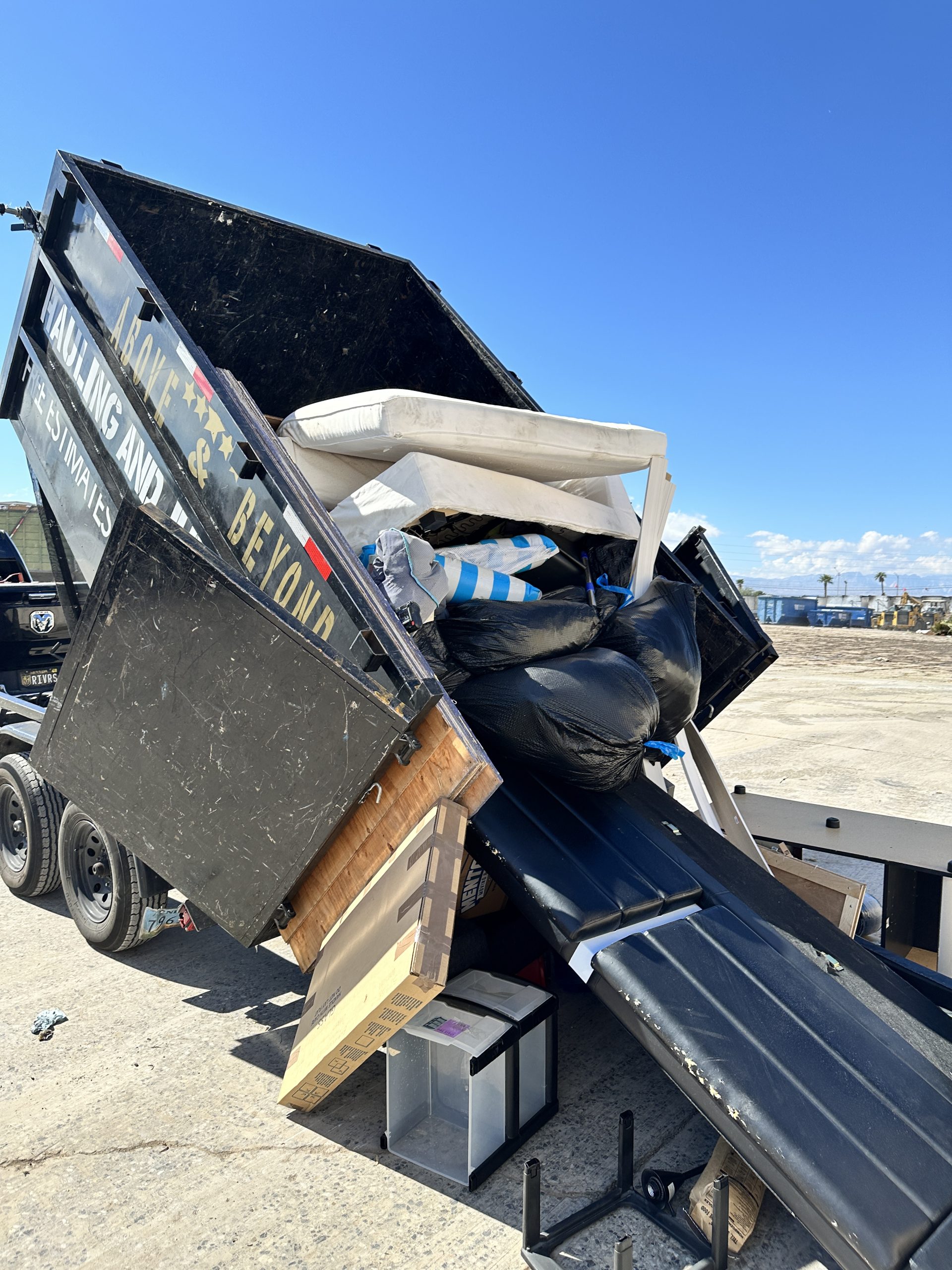 Professional junk removal North Las Vegas crew hauling furniture