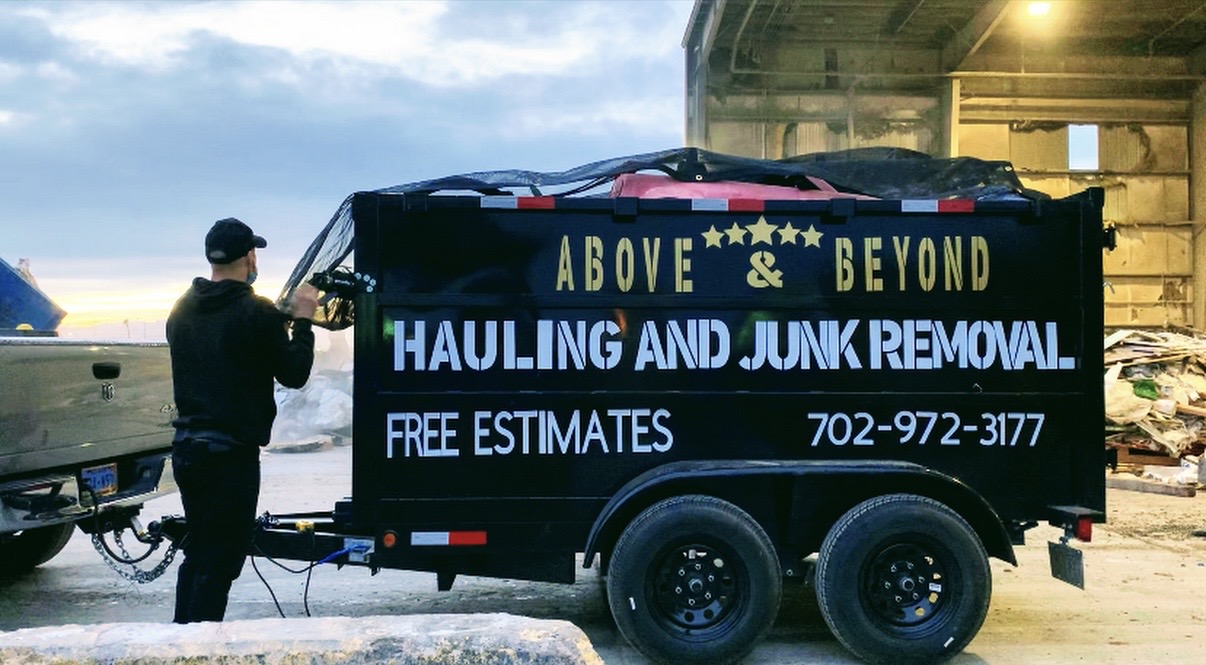 Above and Beyond dump trailer hauling Las Vegas team